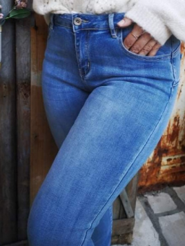 Jean Tom
